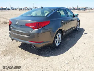 2013 Kia Optima LX with VIN 5XXGM4A74DG093454, listed as a IAAI auction lot 42004990 with 176,667 mi miles. Bid and sale history available at carsss.com. Image 4.