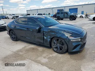 2023 Genesis G70 2.0T with VIN KMTG34TA7PU133747, listed as a Copart auction lot 56338345 with 27,190 mi miles and Salvage title. Bid and sale history available at DreamBid. Image 4.