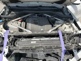 2022 BMW X6 xDrive40i z VIN 5UXCY6C0XN9K78927, wystawiony jako Copart lot #48348335 z przebiegiem 63 074 mil mil oraz Szkoda całkowita • Salvage title. Historia ofert i sprzedaży dostępna na DreamBid. Obrazek 12.