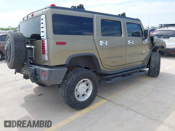 2006 Hummer H2 with VIN 5GRGN23U56H102574, listed as a IAAI auction lot 41955539 with 202,102 mi miles. Bid and sale history available at carsss.com. Image 4.