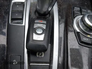 2013 BMW 5 Series 528i xDrive with VIN WBAXH5C5XDD108889, listed as a IAAI auction lot 41620024 with 103,542 mi miles. Bid and sale history available at carsss.com. Image 11.