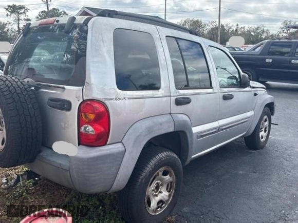 2002 Jeep Liberty Sport with VIN 1J4GL48K72W243074, listed as a Copart auction lot 47081875 with 127,178 mi miles and Clean Title. Bid and sale history available at carsss.com. Image 4.
