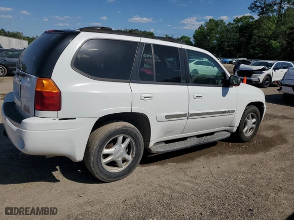 2003 GMC Envoy SLT with VIN 1GKDS13SX32153772, listed as a Copart auction lot 52449815 with 292,752 mi miles and Salvage Title. Bid and sale history available at carsss.com. Image 3.