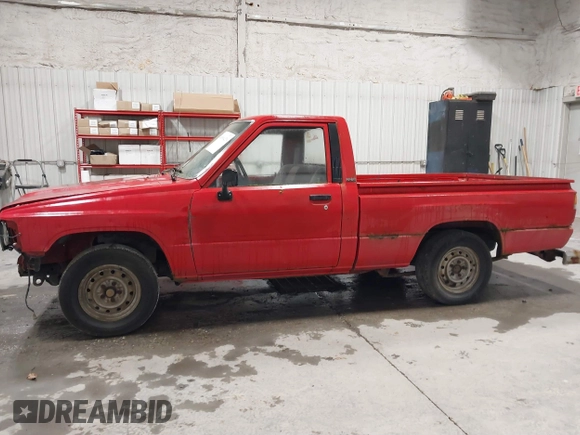 1987 Toyota Pickup with VIN JT4RN50R8H0221202, listed as a IAAI auction lot 40500429 with 304,229 mi miles and . Bid and sale history available at DreamBid. Image 14.