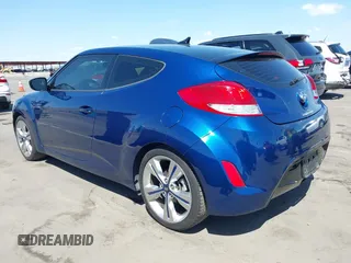 2017 Hyundai Veloster with VIN KMHTC6AD2HU316217, listed as a IAAI auction lot 42055616 with 93,531 mi miles. Bid and sale history available at carsss.com. Image 3.