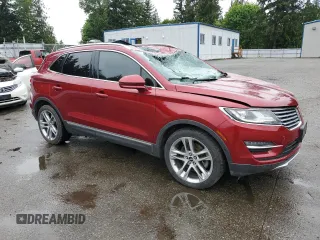 2015 Lincoln MKC z VIN 5LMTJ2AHXFUJ10820, wystawiony jako Copart lot #57139315 z przebiegiem 128 714 mil mil oraz Szkody całkowita. Historia ofert i sprzedaży dostępna na DreamBid. Obrazek 4.