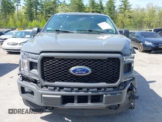 2018 Ford F-150 XL with VIN 1FTEW1EP6JFE00496, listed as a IAAI auction lot 42247235 with 76,858 mi miles and . Bid and sale history available at DreamBid. Image 13.
