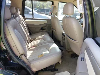 2003 Mercury Mountaineer Convenience z VIN 4M2DU66W13ZJ05239, wystawiony jako IAAI lot #42062881 z przebiegiem 292 631 mil mil oraz . Historia ofert i sprzedaży dostępna na DreamBid. Obrazek 8.