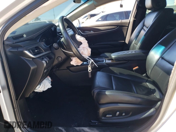 2018 Cadillac XTS with VIN 2G61L5S34J9134469, listed as a Copart auction lot 46660945 with 122,011 mi miles and Salvage Title. Bid and sale history available at carsss.com. Image 7.