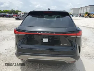 2023 Lexus RX 350 z VIN 2T2BAMBA3PC004378, wystawiony jako Copart lot #63559135 z przebiegiem 18 609 mil mil oraz Czysty tytuł • Clean title. Historia ofert i sprzedaży dostępna na DreamBid. Obrazek 6.