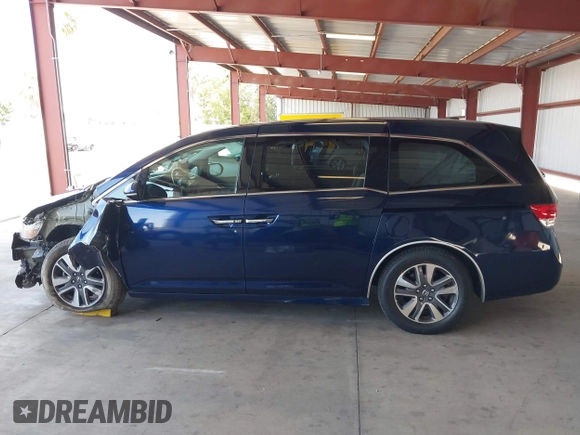2017 Honda Odyssey Touring with VIN 5FNRL5H90HB017215, listed as a IAAI auction lot 42574528 with 61,386 mi miles and . Bid and sale history available at DreamBid. Image 14.