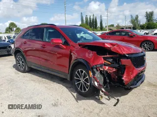 2024 Cadillac XT4 FWD Sport with VIN 1GYFZER48RF164992, listed as a Copart auction lot 68359734 with 3,427 mi miles and Salvage title. Bid and sale history available at DreamBid. Image 4.
