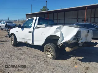 2003 Ford F-150 XL with VIN 2FTRF17W03CA59388, listed as a IAAI auction lot 41673651 with 221,668 mi miles. Bid and sale history available at carsss.com. Image 3.