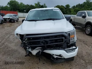 2021 Ford F-150 XL with VIN 1FTFW1E59MFA70313, listed as a Copart auction lot 60793215 with 52,387 mi miles and Salvage title. Bid and sale history available at DreamBid. Image 5.