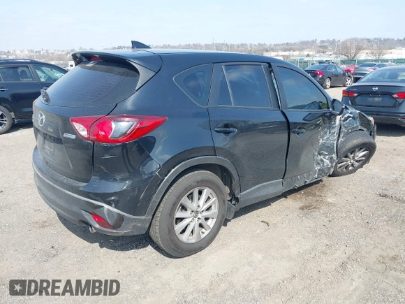 2016 Mazda CX-5 Sport with VIN JM3KE4BY3G0843177, listed as a IAAI auction lot 41804094 with 193,461 mi miles. Bid and sale history available at carsss.com. Image 4.