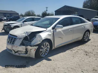 2015 Cadillac XTS Luxury z VIN 2G61M5S39F9200454, wystawiony jako Copart lot #52698995 z przebiegiem Nie podano mil oraz Szkoda całkowita • Salvage title. Historia ofert i sprzedaży dostępna na DreamBid. Obrazek 1.