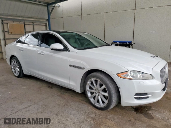2011 Jaguar XJ with VIN SAJWA1CB2BLV07172, listed as a Copart auction lot 63343085 with 135,119 mi miles and Salvage title. Bid and sale history available at DreamBid. Image 4.