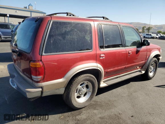 2001 Ford Explorer z VIN 1FMDU64P21UB11722, wystawiony jako Copart lot #57425525 z przebiegiem 116 938 mil mil oraz Szkoda całkowita • Salvage title. Historia ofert i sprzedaży dostępna na DreamBid. Obrazek 3.