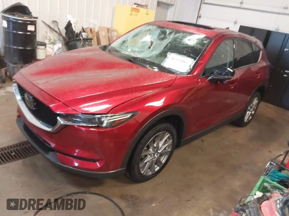 2020 Mazda CX-5 Grand Touring with VIN JM3KFBDMXL0840847, listed as a IAAI auction lot 41732185 with 36,248 mi miles. Bid and sale history available at carsss.com. Image 17.