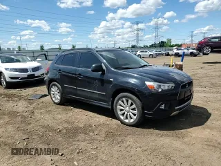 2011 Mitsubishi Outlander SE z VIN JA4AR4AU5BZ002340, wystawiony jako Copart lot #58254175 z przebiegiem 145 287 mil mil oraz Szkoda całkowita • Salvage title. Historia ofert i sprzedaży dostępna na DreamBid. Obrazek 14.