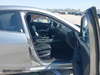 2016 Mazda Mazda3 i Sport with VIN JM1BM1U74G1280293, listed as a IAAI auction lot 41925632 with 119,679 mi miles. Bid and sale history available at carsss.com. Image 5.