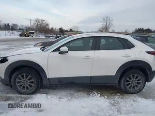 2021 Mazda CX-30 S with VIN 3MVDMBAL9MM221639, listed as a IAAI auction lot 41545920 with 57,239 mi miles and . Bid and sale history available at carsss.com. Image 15.