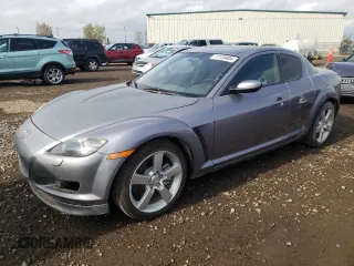 2005 Mazda RX-8 with VIN JM1FE173050145886, listed as a Copart auction lot 71110404 with 66,894 mi miles and Salvage Title. Bid and sale history available at carsss.com. Image 1.