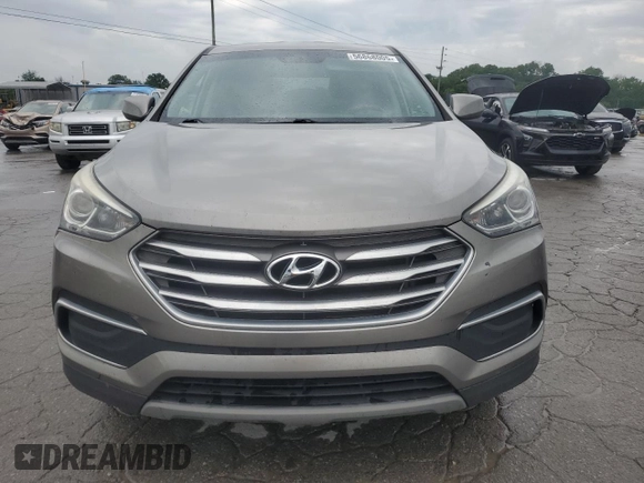 2018 Hyundai Santa Fe 2.4L z VIN 5NMZTDLB7JH098559, wystawiony jako Copart lot #56868005 z przebiegiem 197 233 mil mil oraz Czysty tytuł • Clean title. Historia ofert i sprzedaży dostępna na DreamBid. Obrazek 5.