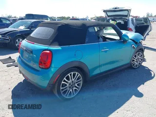 2016 MINI Convertible z VIN WMWWG5C5XG3A83276, wystawiony jako IAAI lot #41864830 z przebiegiem 103 721 mil mil oraz . Historia ofert i sprzedaży dostępna na DreamBid. Obrazek 4.