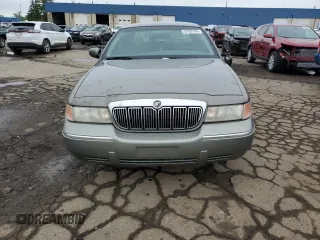2000 Mercury Grand Marquis LS z VIN 2MEFM75WXYX742065, wystawiony jako Copart lot #57655795 z przebiegiem 175 070 mil mil oraz Tytuł czysty. Historia ofert i sprzedaży dostępna na DreamBid. Obrazek 5.