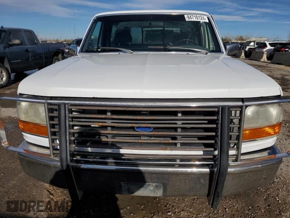 1993 Ford F-150 with VIN 1FTDF15Y4PNA36291, listed as a Copart auction lot 84710124 with 143,164 mi miles and Salvage Title. Bid and sale history available at carsss.com. Image 5.