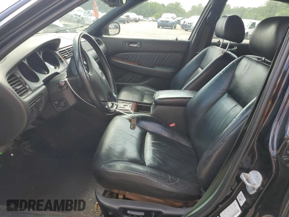 2002 Acura RL with VIN JH4KA96622C006520, listed as a Copart auction lot 63315055 with Not provided miles and Salvage title. Bid and sale history available at DreamBid. Image 7.