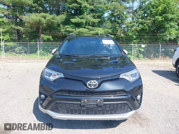 2016 Toyota RAV4 SE with VIN JTMJFREV2GJ089599, listed as a IAAI auction lot 42551300 with 90,352 mi miles and . Bid and sale history available at DreamBid. Image 13.