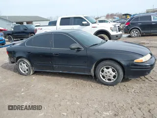 2004 Oldsmobile Alero GX z VIN 1G3NK52F44C107863, wystawiony jako IAAI lot #42018564 z przebiegiem 128 534 mil mil oraz . Historia ofert i sprzedaży dostępna na DreamBid. Obrazek 14.