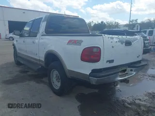 2002 Ford F-150 XLT with VIN 1FTRW08L02KA10457, listed as a IAAI auction lot 41704625 with 151,072 mi miles. Bid and sale history available at carsss.com. Image 3.