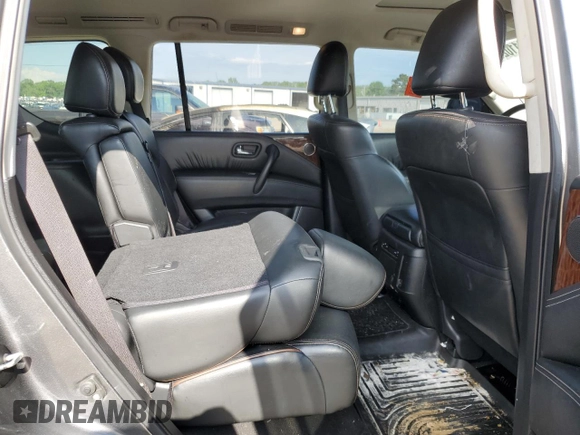 2019 Nissan Armada SL z VIN JN8AY2NDXK9088594, wystawiony jako Copart lot #59639735 z przebiegiem 127 938 mil mil oraz Szkoda całkowita • Salvage title. Historia ofert i sprzedaży dostępna na DreamBid. Obrazek 10.