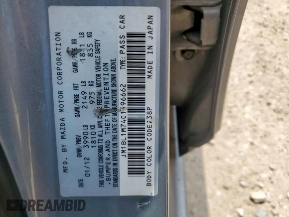 2012 Mazda 3 i Grand Touring with VIN JM1BL1M74C1596662, listed as a Copart auction lot 60022285 with 198,375 mi miles and Salvage title. Bid and sale history available at DreamBid. Image 12.