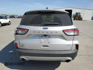2020 Ford Escape SE с VIN 1FMCU9G66LUC61609, выставлен на аукционе Copart как лот 53949895 с пробегом 32 020 миль миль и Списание • Salvage title. История ставок и продаж доступна на DreamBid. Изображение 6.