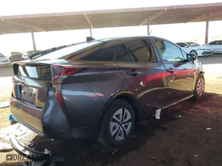 2018 Toyota Prius Two with VIN JTDKARFUXJ3062963, listed as a IAAI auction lot 41588989 with 114,842 mi miles. Bid and sale history available at carsss.com. Image 4.