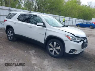 2018 Chevrolet Traverse LT z VIN 1GNEVHKW4JJ275817, wystawiony jako IAAI lot #42179473 z przebiegiem 81 595 mil mil oraz . Historia ofert i sprzedaży dostępna na DreamBid. Obrazek 1.