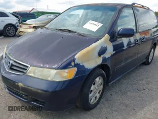 2004 Honda Odyssey EX-RES z VIN 5FNRL18874B132825, wystawiony jako IAAI lot #41978812 z przebiegiem 147 792 mil mil oraz . Historia ofert i sprzedaży dostępna na DreamBid. Obrazek 2.