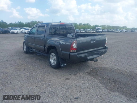 2014 Toyota Tacoma with VIN 5TFLU4EN9EX099414, listed as a IAAI auction lot 40528514 with 122,827 mi miles. Bid and sale history available at carsss.com. Image 3.