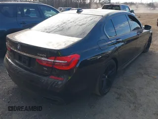 2019 BMW 7 Series 750i xDrive with VIN WBA7F2C52KB240302, listed as a IAAI auction lot 40984933 with 93,737 mi miles and . Bid and sale history available at DreamBid. Image 4.