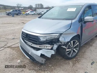 2021 Honda Odyssey Touring with VIN 5FNRL6H8XMB034837, listed as a IAAI auction lot 41856444 with 84,950 mi miles. Bid and sale history available at carsss.com. Image 6.