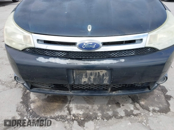 2008 Ford Focus SE with VIN 1FAHP33N38W107114, listed as a IAAI auction lot 42076432 with 124,487 mi miles. Bid and sale history available at carsss.com. Image 6.
