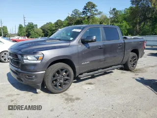 2023 Ram 1500 Laramie with VIN 1C6SRFJT7PN602148, listed as a Copart auction lot 52696735 with Not provided miles and Salvage title. Bid and sale history available at DreamBid. Image 1.