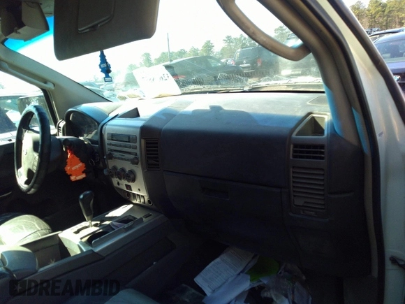 2005 Nissan Titan SE with VIN 1N6AA07B25N514643, listed as a IAAI auction lot 32638857 with 214,304 mi miles. Bid and sale history available at carsss.com. Image 5.