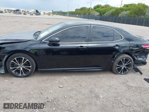 2018 Toyota Camry LE z VIN 4T1B11HK6JU158382, wystawiony jako IAAI lot #42185532 z przebiegiem 94 802 mil mil oraz . Historia ofert i sprzedaży dostępna na DreamBid. Obrazek 15.