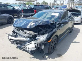 2017 Honda Civic Hatchback Sport with VIN SHHFK7H41HU402125, listed as a IAAI auction lot 41960146 with 80,368 mi miles. Bid and sale history available at carsss.com. Image 2.