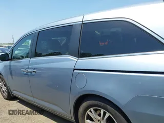 2011 Honda Odyssey EX-L with VIN 5FNRL5H60BB051135, listed as a IAAI auction lot 42588994 with 195,112 mi miles and . Bid and sale history available at DreamBid. Image 14.
